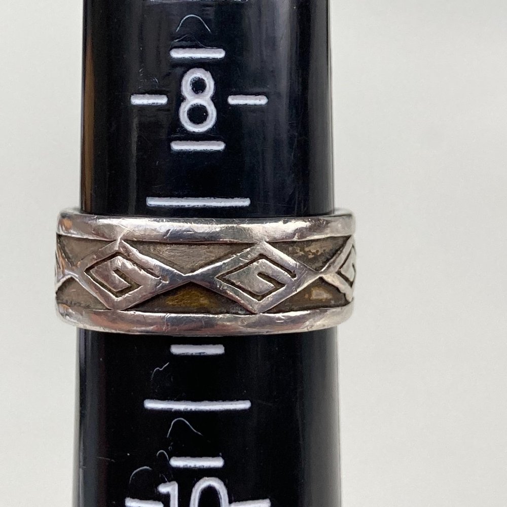 Impressive sterling silver ring with Greek key-like symbols